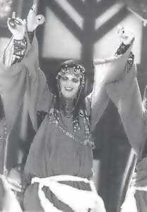 Bàraka Dancing With Hahbi 'Ru Wearing A Tunisian-Style Costume